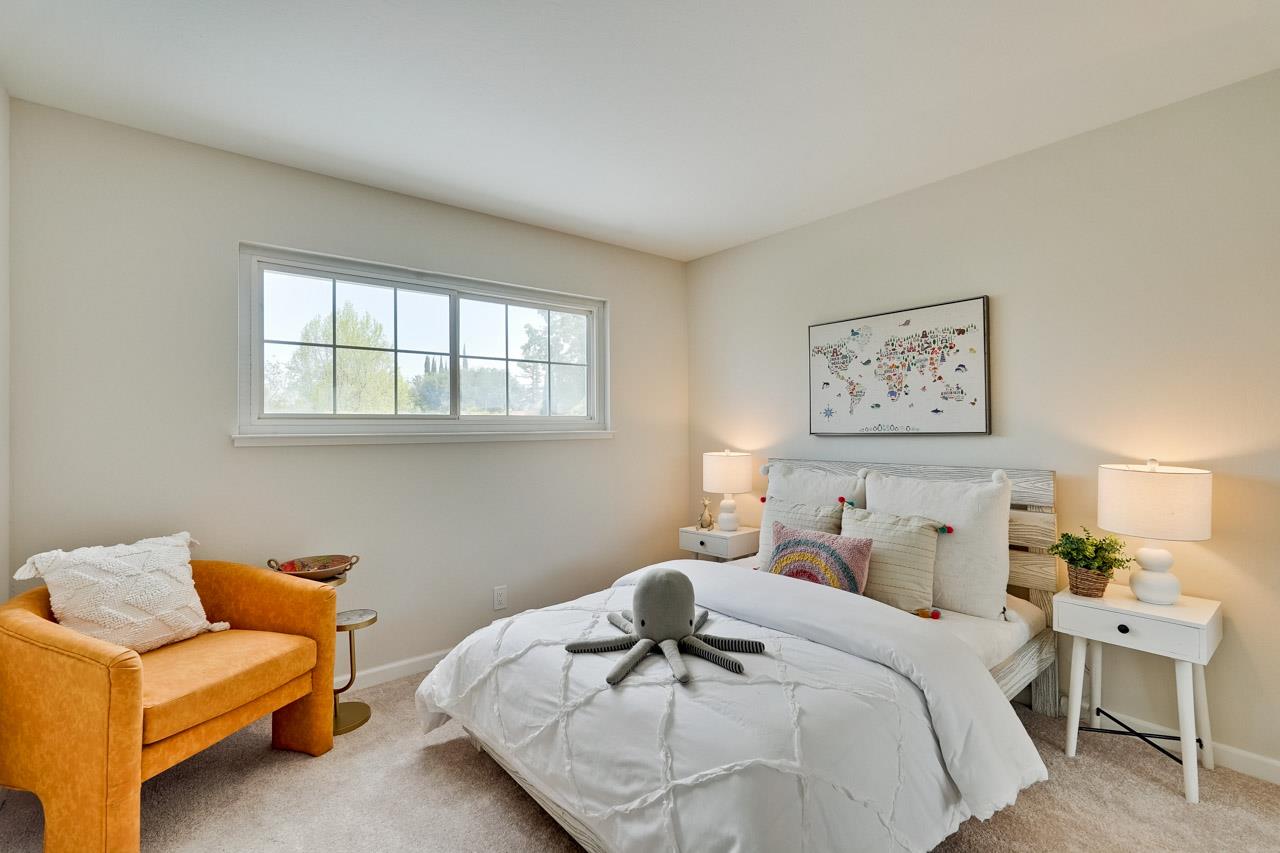 592 Torland Court Sunnyvale, CA 94087 - Photo 29 of 51 a bedroom with a bed and a window
