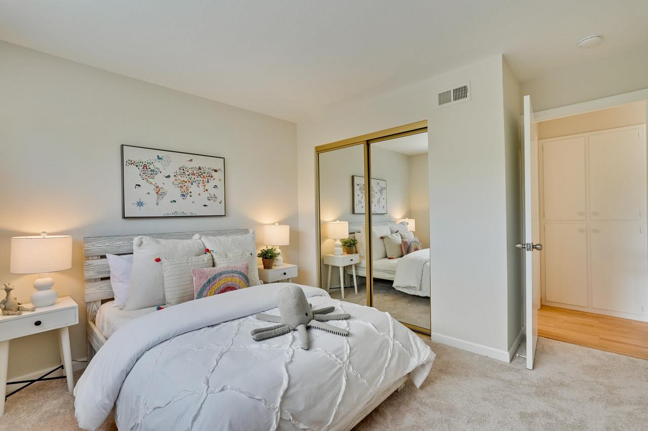 592 Torland Court Sunnyvale, CA 94087 - Photo 30 of 51 a bedroom with a bed and a view of bathroom