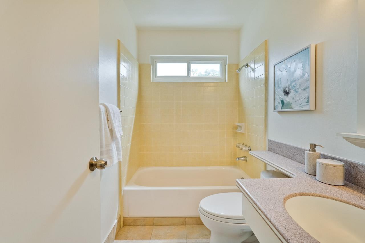 592 Torland Court Sunnyvale, CA 94087 - Photo 32 of 51 a bathroom with a granite countertop toilet sink and bathtub