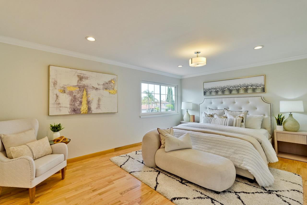 592 Torland Court Sunnyvale, CA 94087 - Photo 33 of 51 a bedroom with a bed and a couch