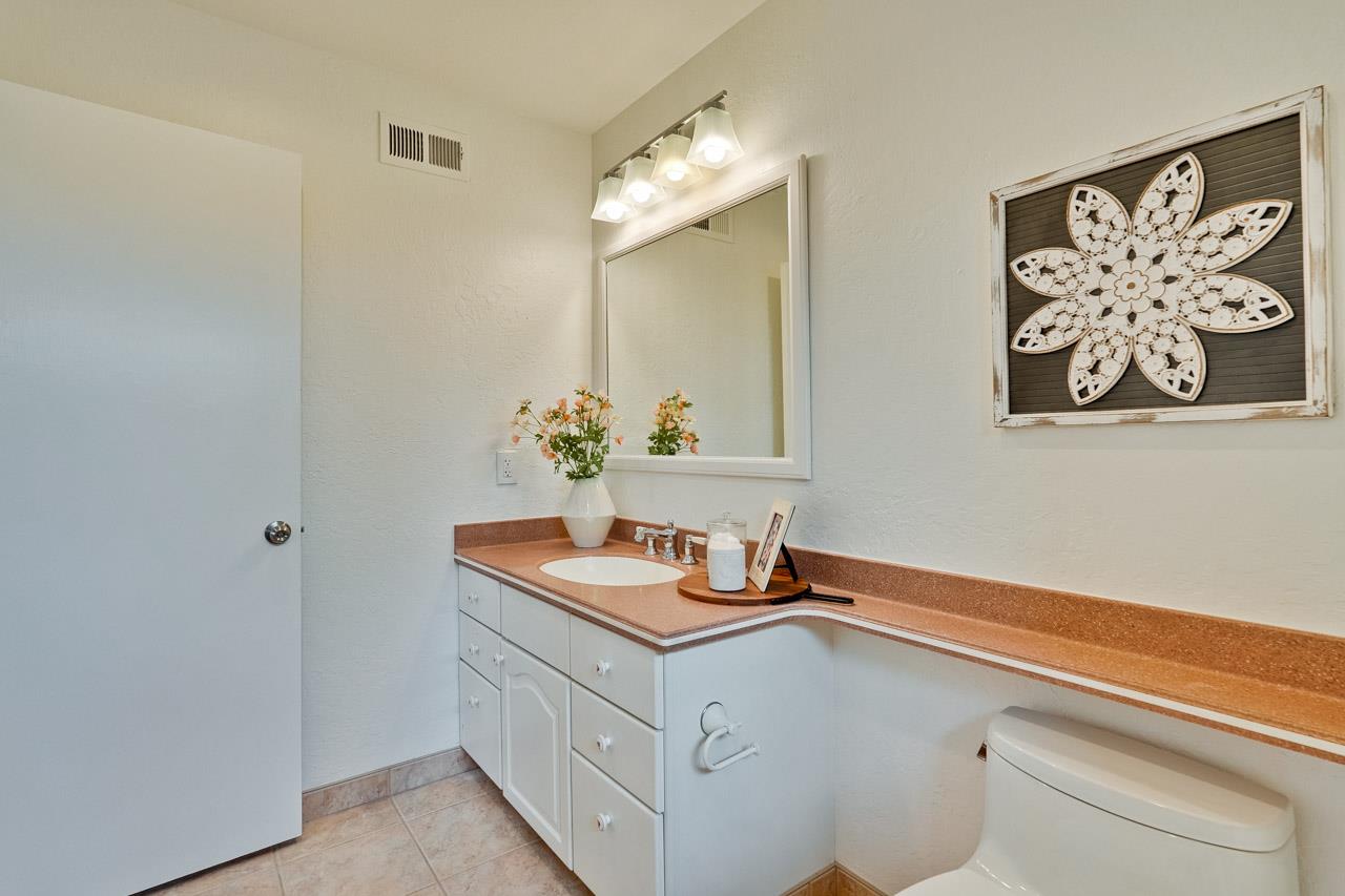 592 Torland Court Sunnyvale, CA 94087 - Photo 38 of 51 a bathroom with a sink and a mirror
