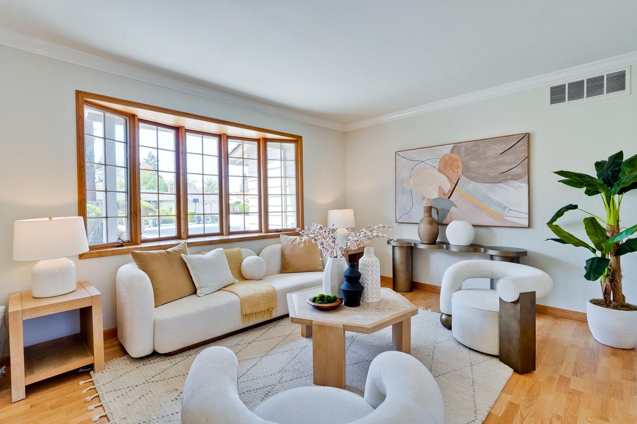 592 Torland Court Sunnyvale, CA 94087 - Photo 4 of 51 a living room with furniture and a large window