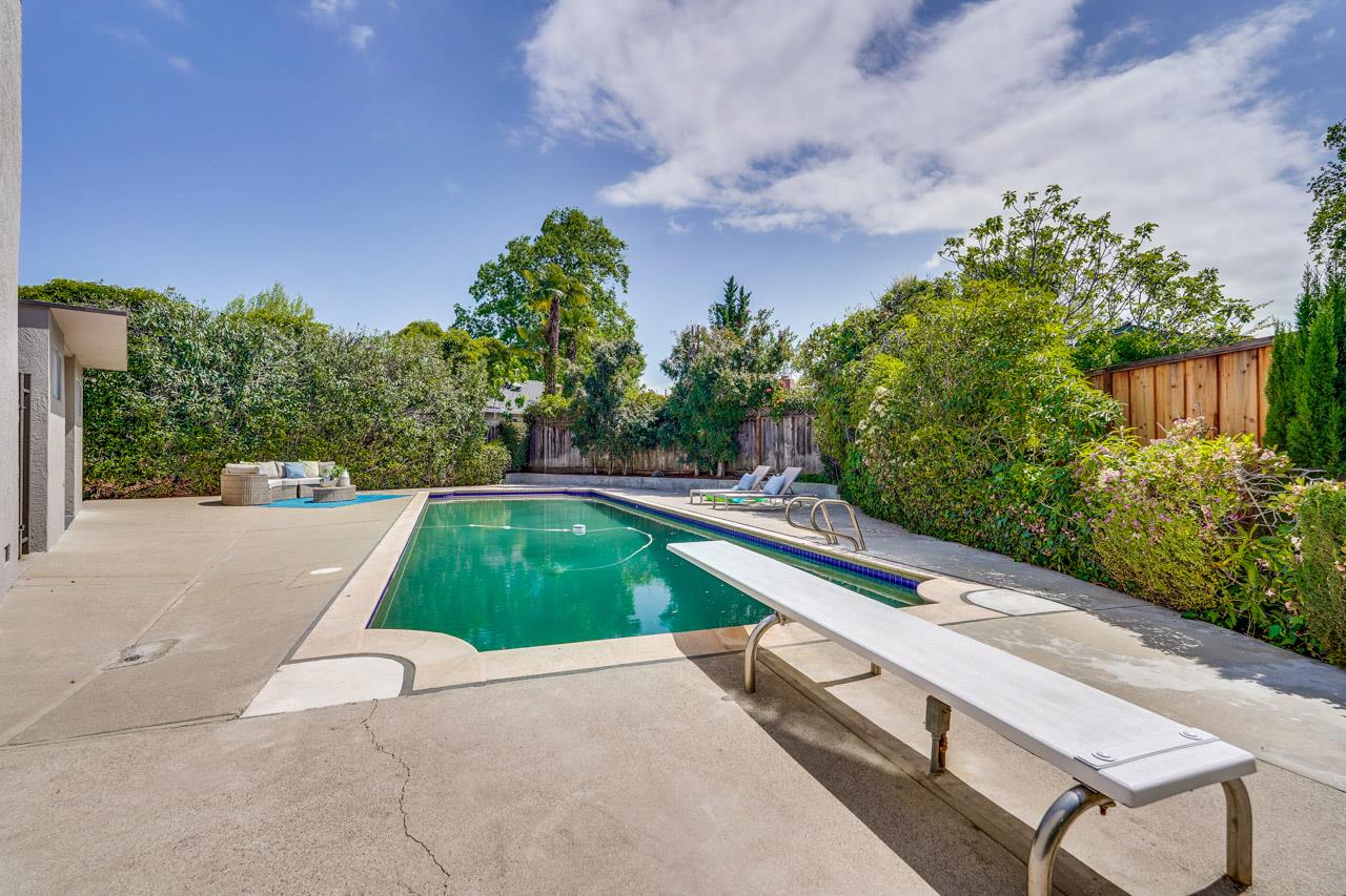 592 Torland Court Sunnyvale, CA 94087 - Photo 46 of 51 a view of backyard with swimming pool and outdoor seating