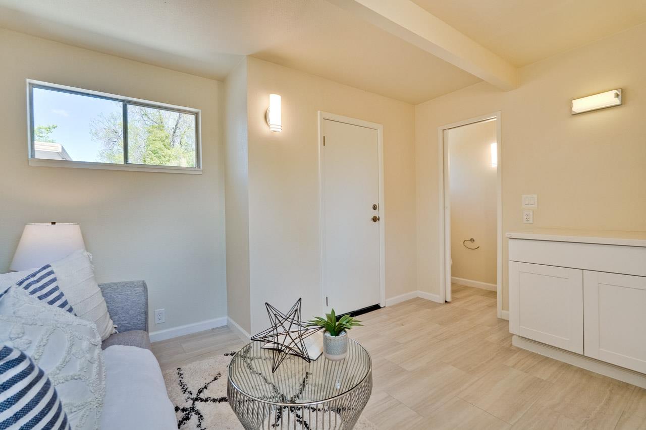 592 Torland Court Sunnyvale, CA 94087 - Photo 48 of 51 a living room with furniture and a potted plant