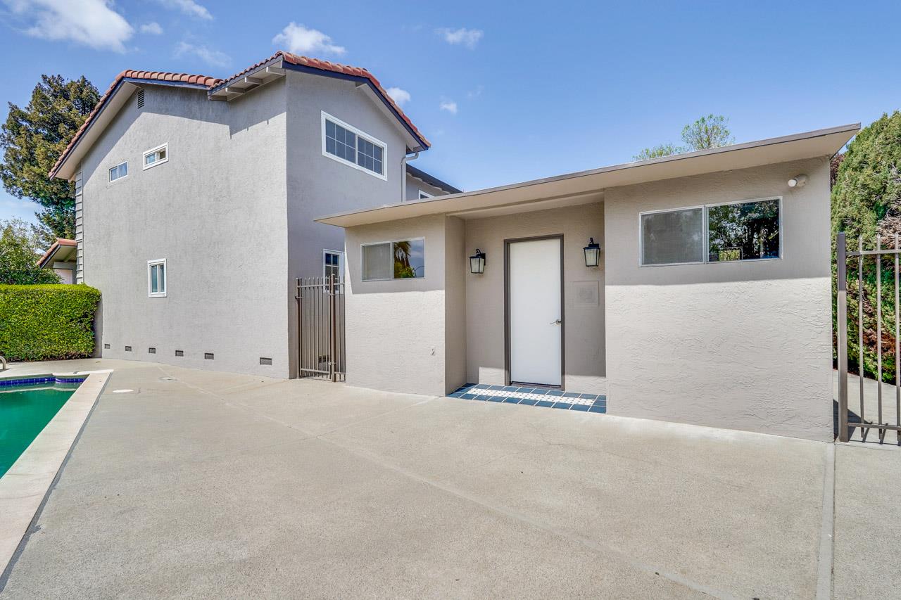 592 Torland Court Sunnyvale, CA 94087 - Photo 50 of 51 a view of a house with a yard and garage