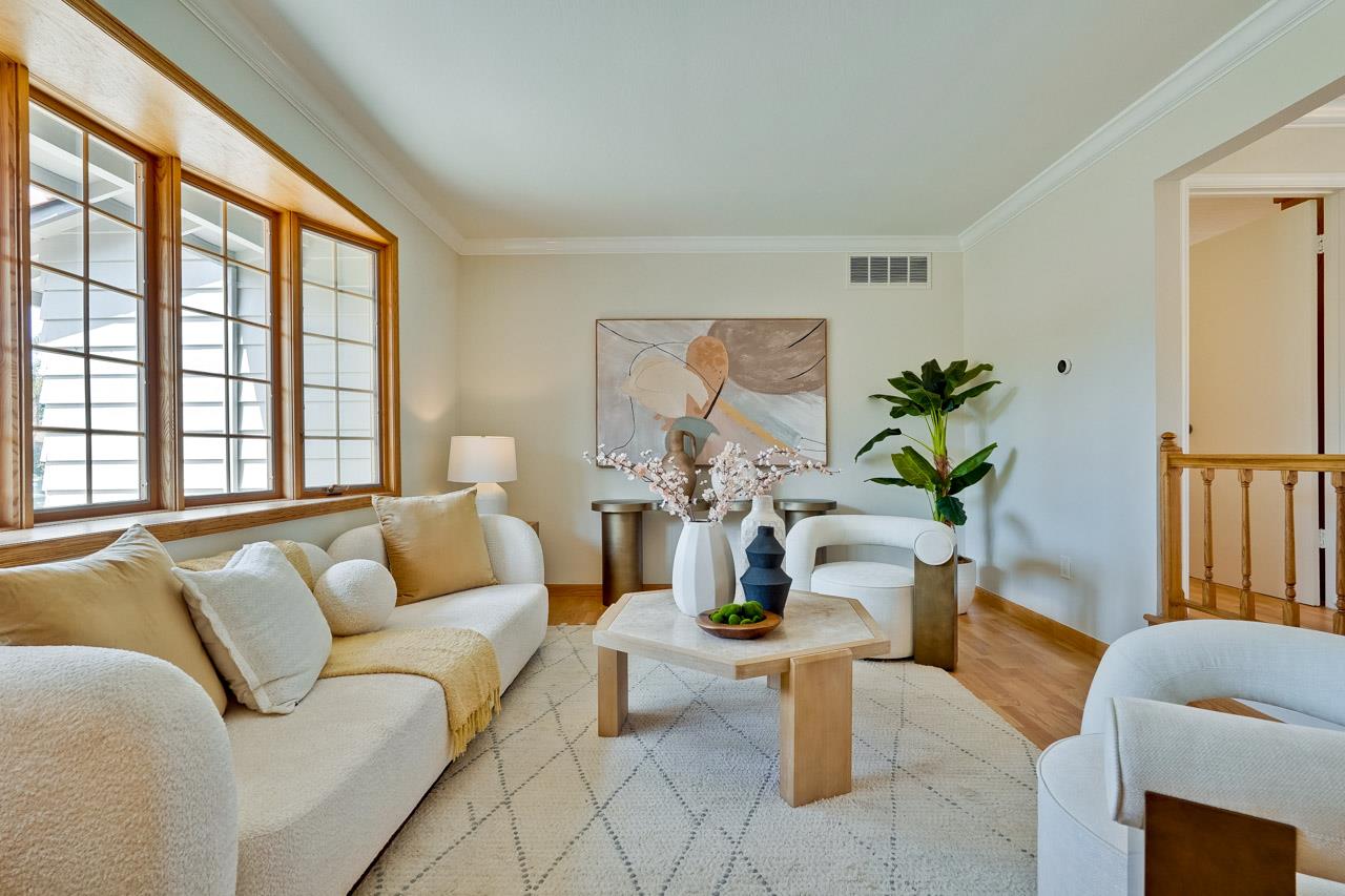 592 Torland Court Sunnyvale, CA 94087 - Photo 6 of 51 a living room with furniture and a large window