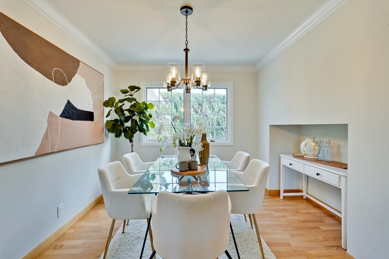 592 Torland Court Sunnyvale, CA 94087 - Photo 9 of 51 a dining room with furniture a chandelier and wooden floor