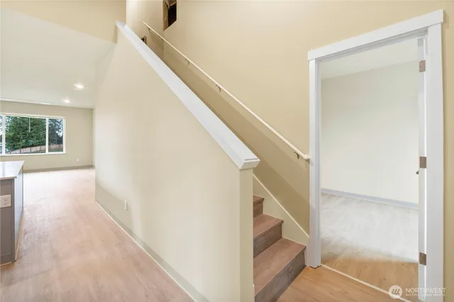 a view of entryway with wooden floor