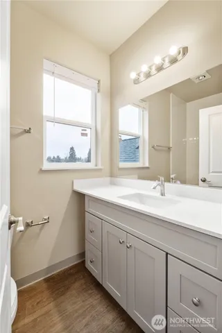 a kitchen with a sink and a window