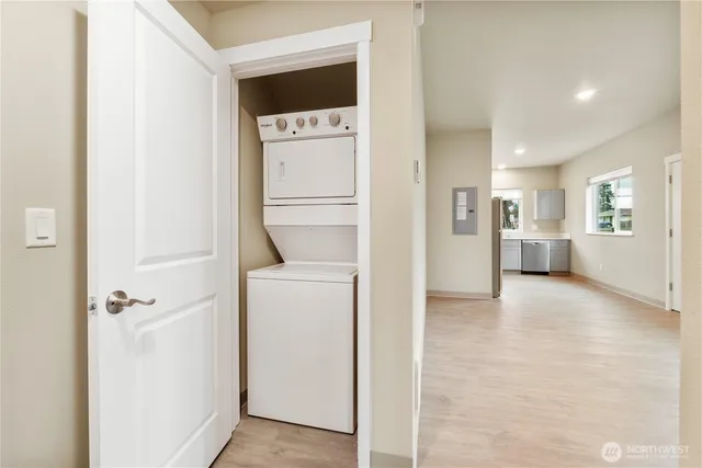 a view of hallway with washer and dryer