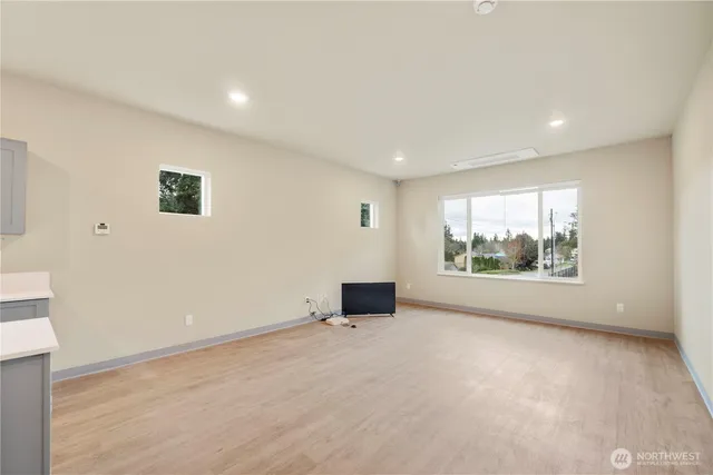 an empty room with windows