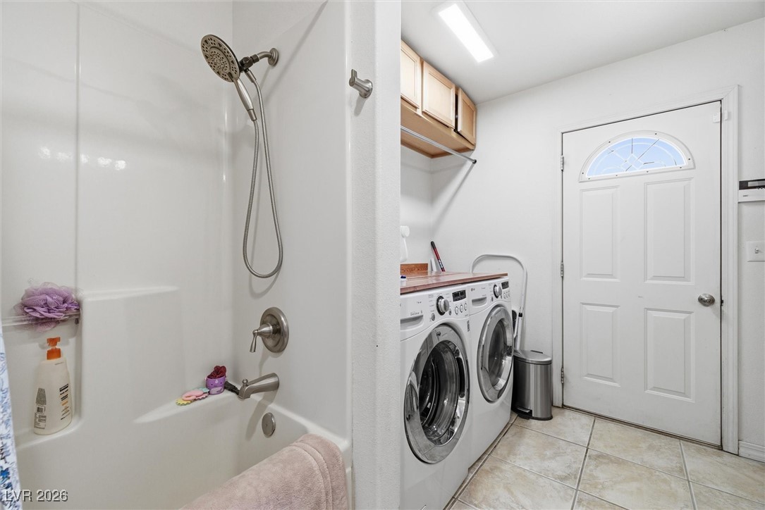 2570 East Kellogg Road Pahrump, NV 89048 - Photo 36 of 60 Laundry room, extra bathroom with shower and access to outside. Perfect to rise off after getting out of the pool.