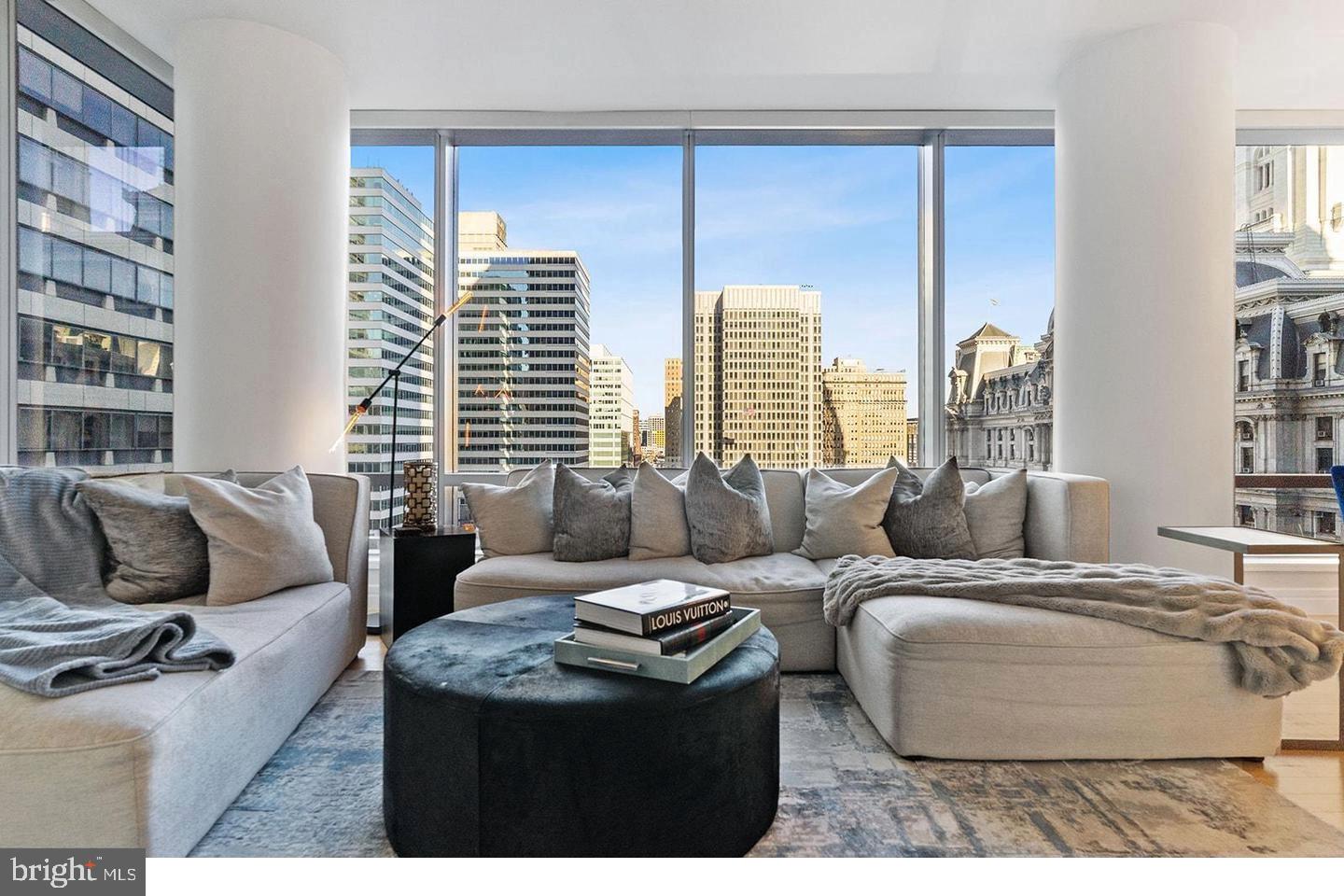 1414 South Penn Square, Unit 7F Philadelphia, PA 19102 - Photo 11 of 30 a living room with furniture and a flat screen tv