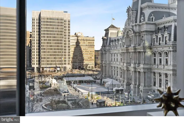 a view of a city with tall buildings