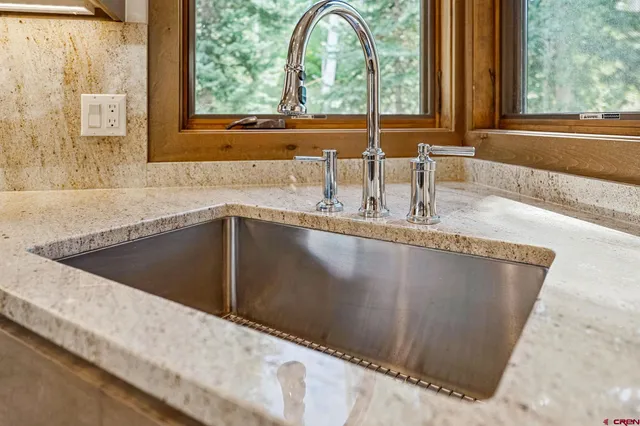 a view closeup a window and a sink