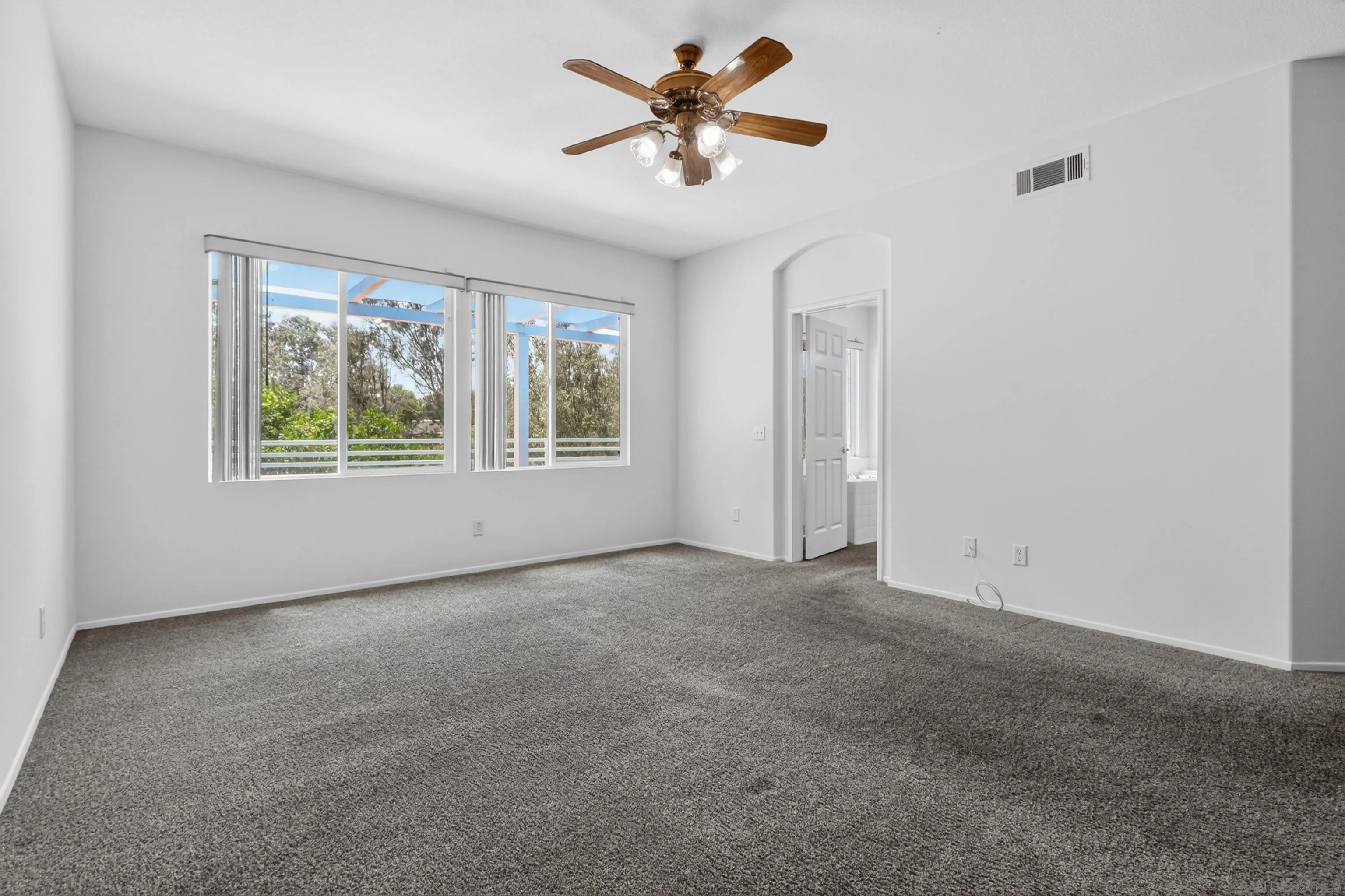 1432 Belmont Park Road Oceanside, CA 92057 - Photo 39 of 54 a view of an empty room with a window