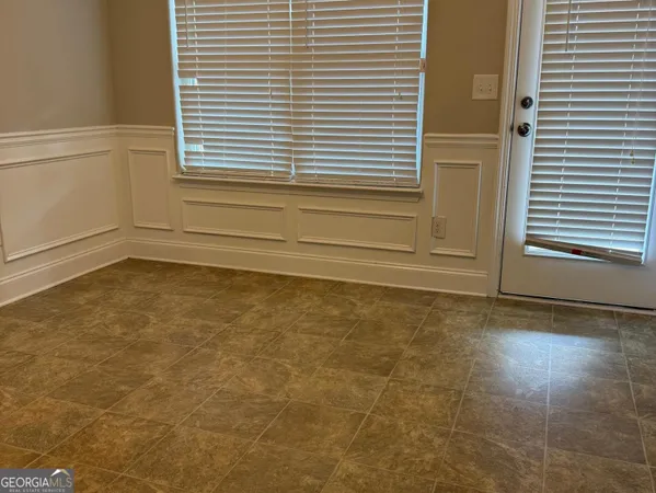 a view of a room with a window