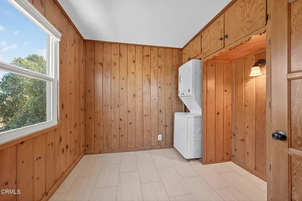 a view of a room with door and stairs