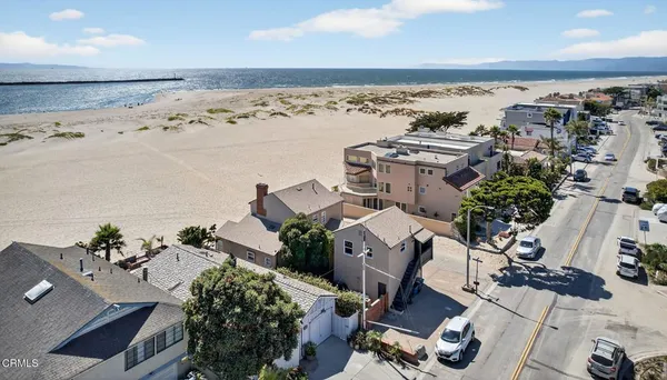 an aerial view of ocean and beach