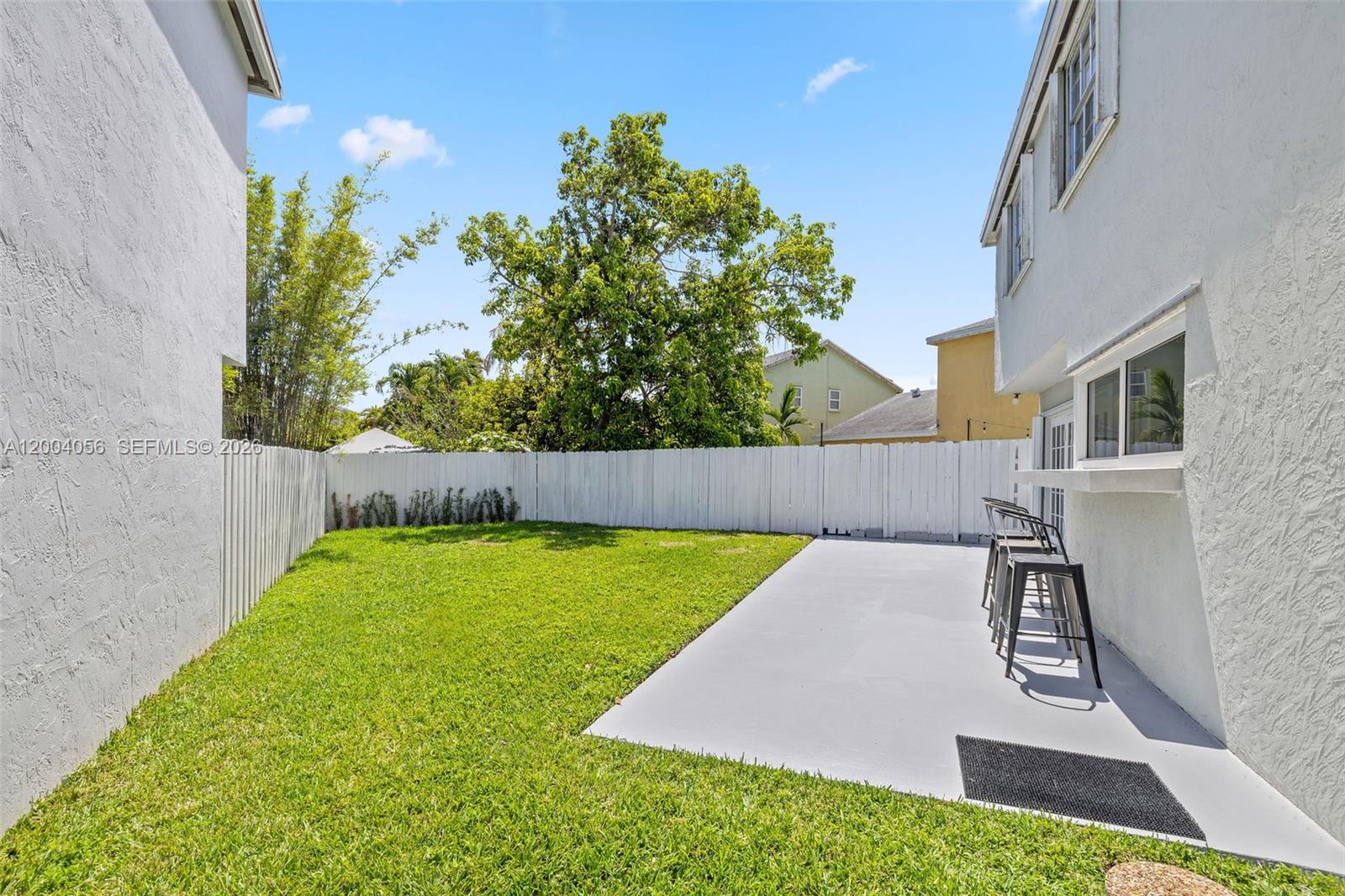 9547 Southwest 146th Place Miami, FL 33186 - Photo 37 of 40 a view of yard with swimming pool