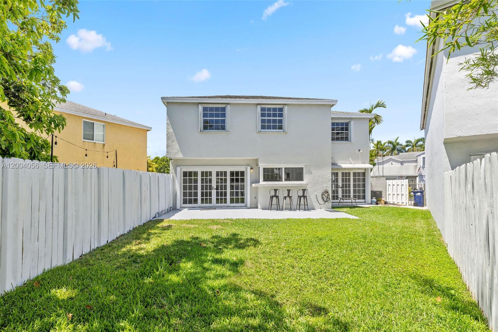 9547 Southwest 146th Place Miami, FL 33186 - Photo 39 of 40 a house view with a outdoor space