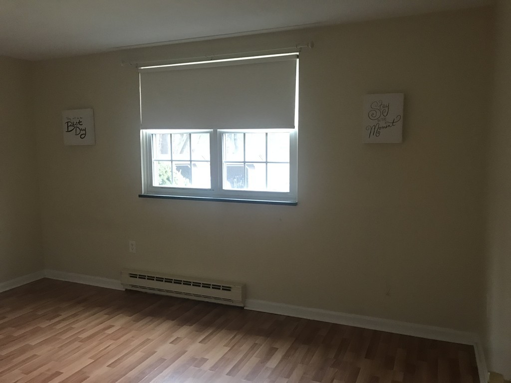 120 Parker Street, Unit 25 Acton, MA 01720 - Photo 7 of 11 an empty room with a window