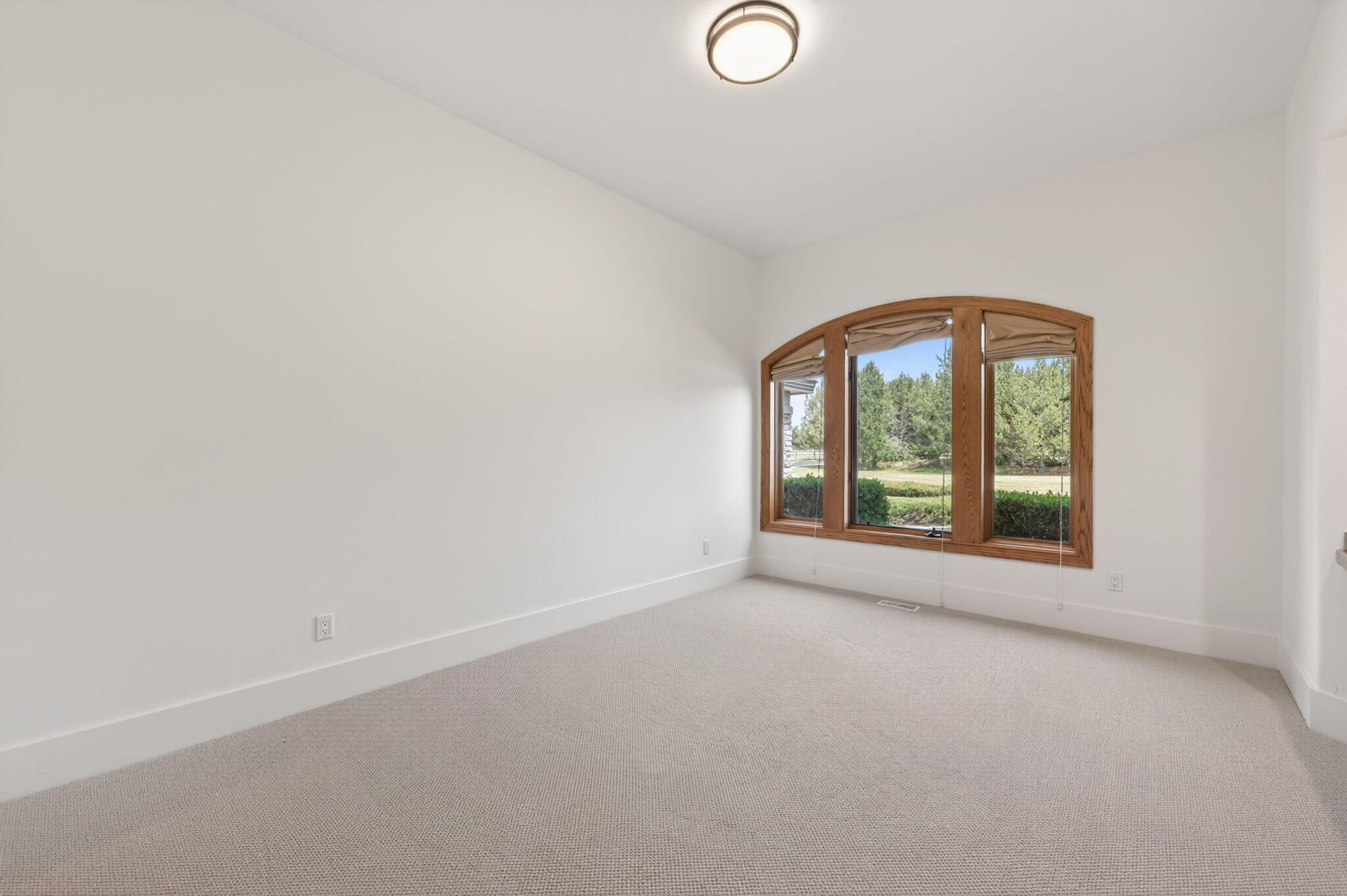 20180 Winston Loop Bend, OR 97703 - Photo 28 of 59 a view of a room that has a large window