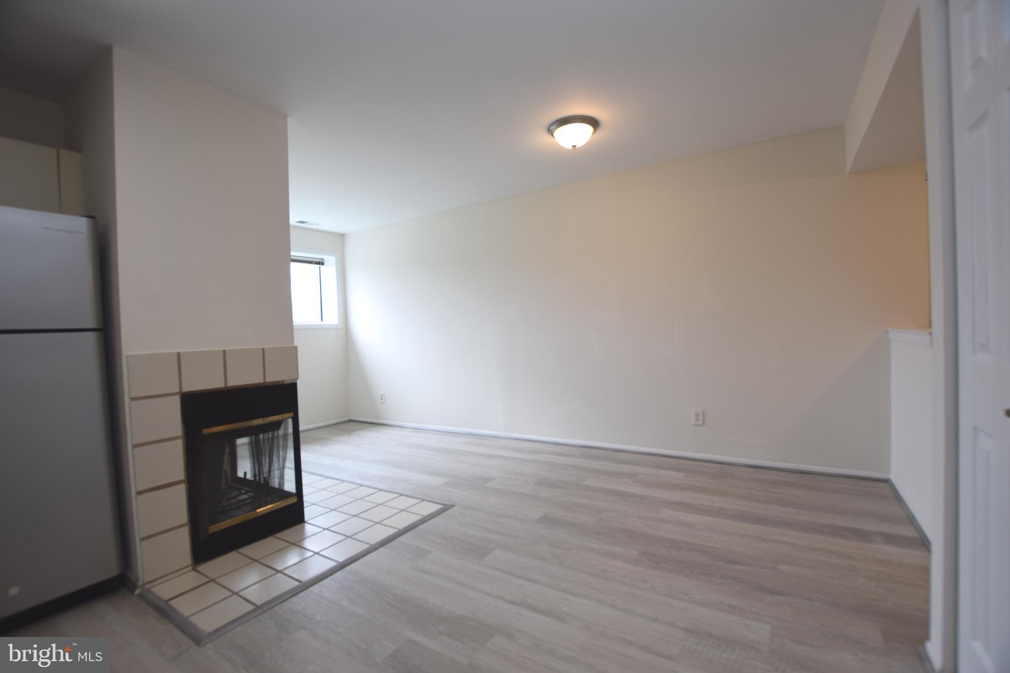 6907 Jones View Drive, Unit 1B Baltimore, MD 21209 - Photo 11 of 25 Lots of Table Space in Kitchen Dining Area