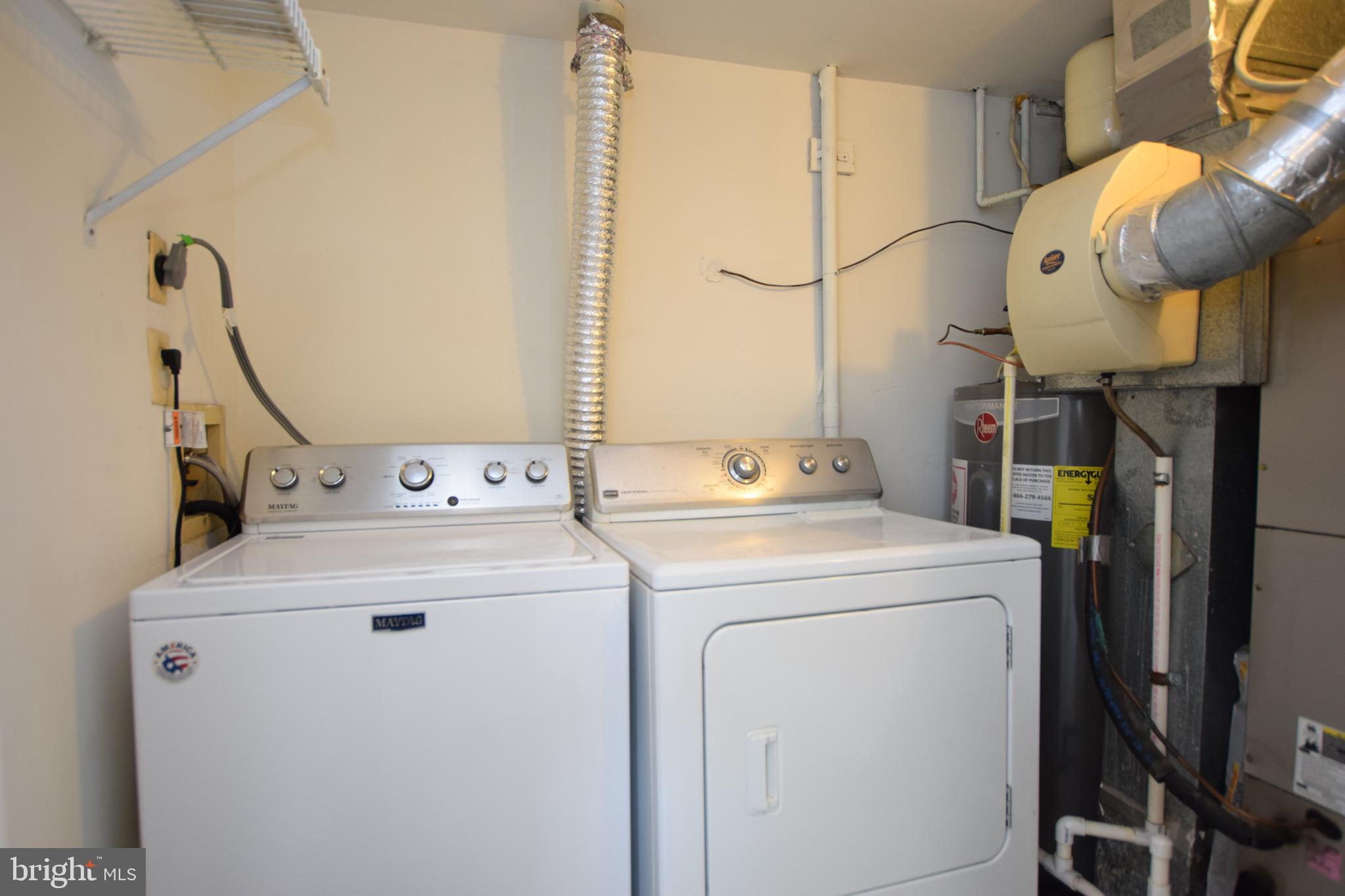 6907 Jones View Drive, Unit 1B Baltimore, MD 21209 - Photo 13 of 25 Laundry Closet off Kitchen