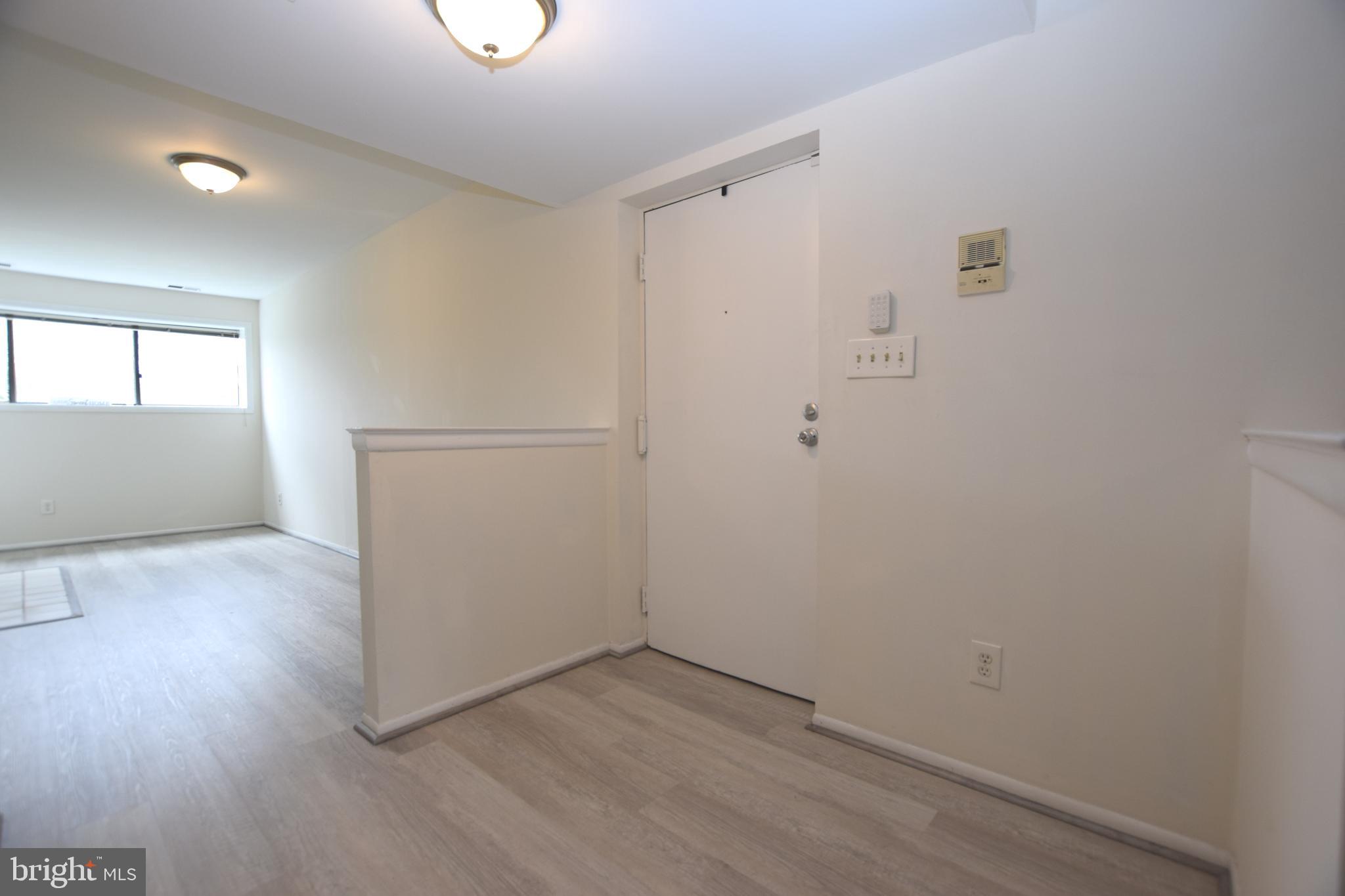 6907 Jones View Drive, Unit 1B Baltimore, MD 21209 - Photo 3 of 25 Entry Door into Condo