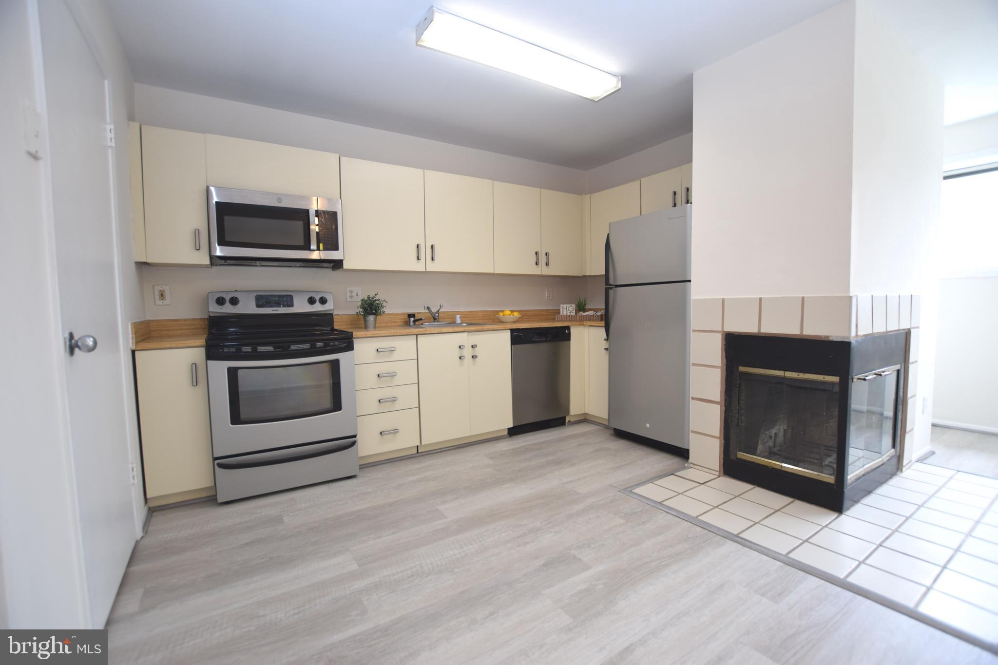 6907 Jones View Drive, Unit 1B Baltimore, MD 21209 - Photo 9 of 25 Kitchen has SS Appliances