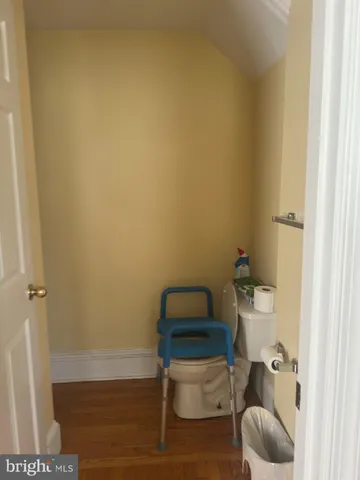 a bathroom with a toilet and a sink