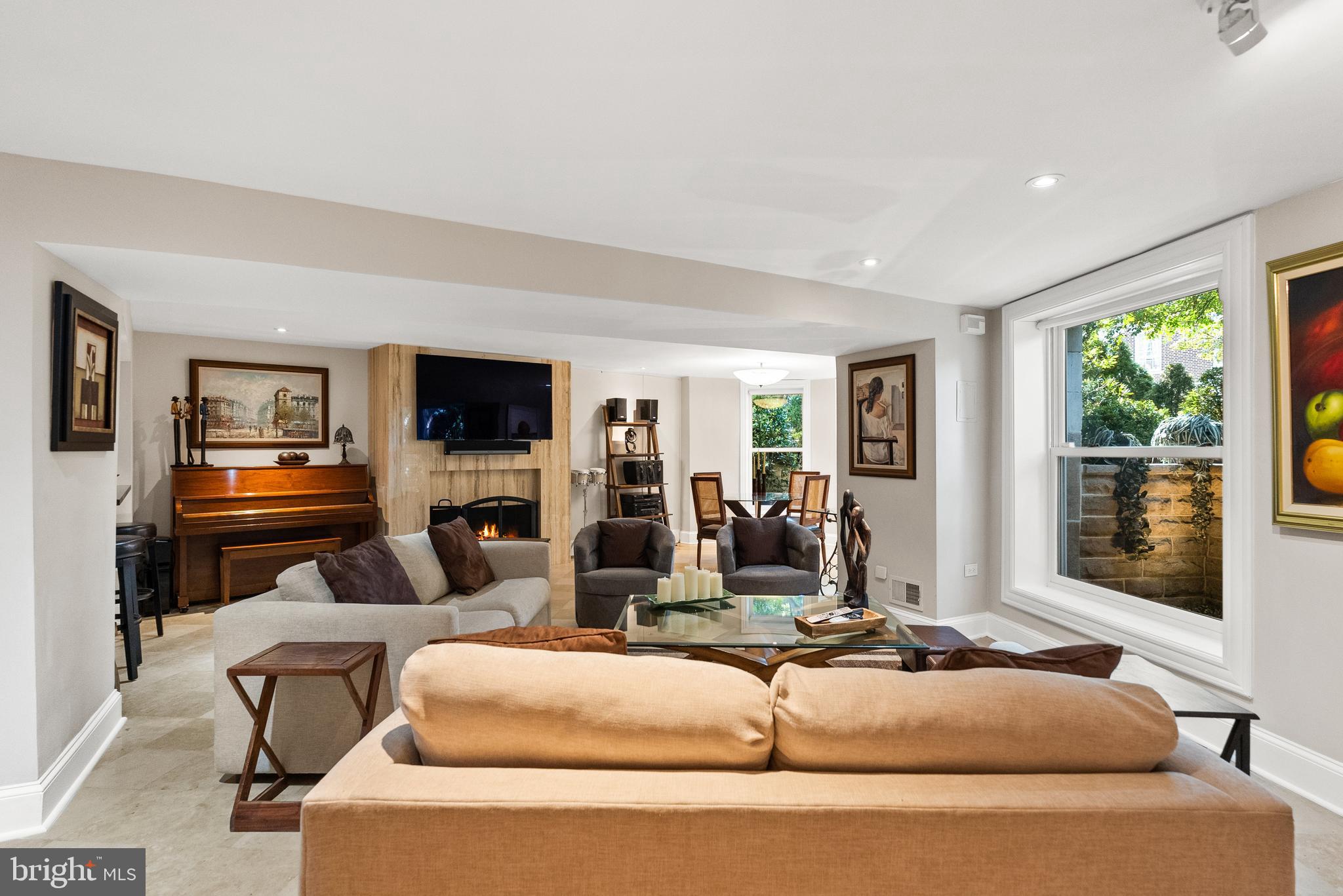 2131 S Street Northwest Washington, DC 20008 - Photo 12 of 29 a living room with furniture and large windows