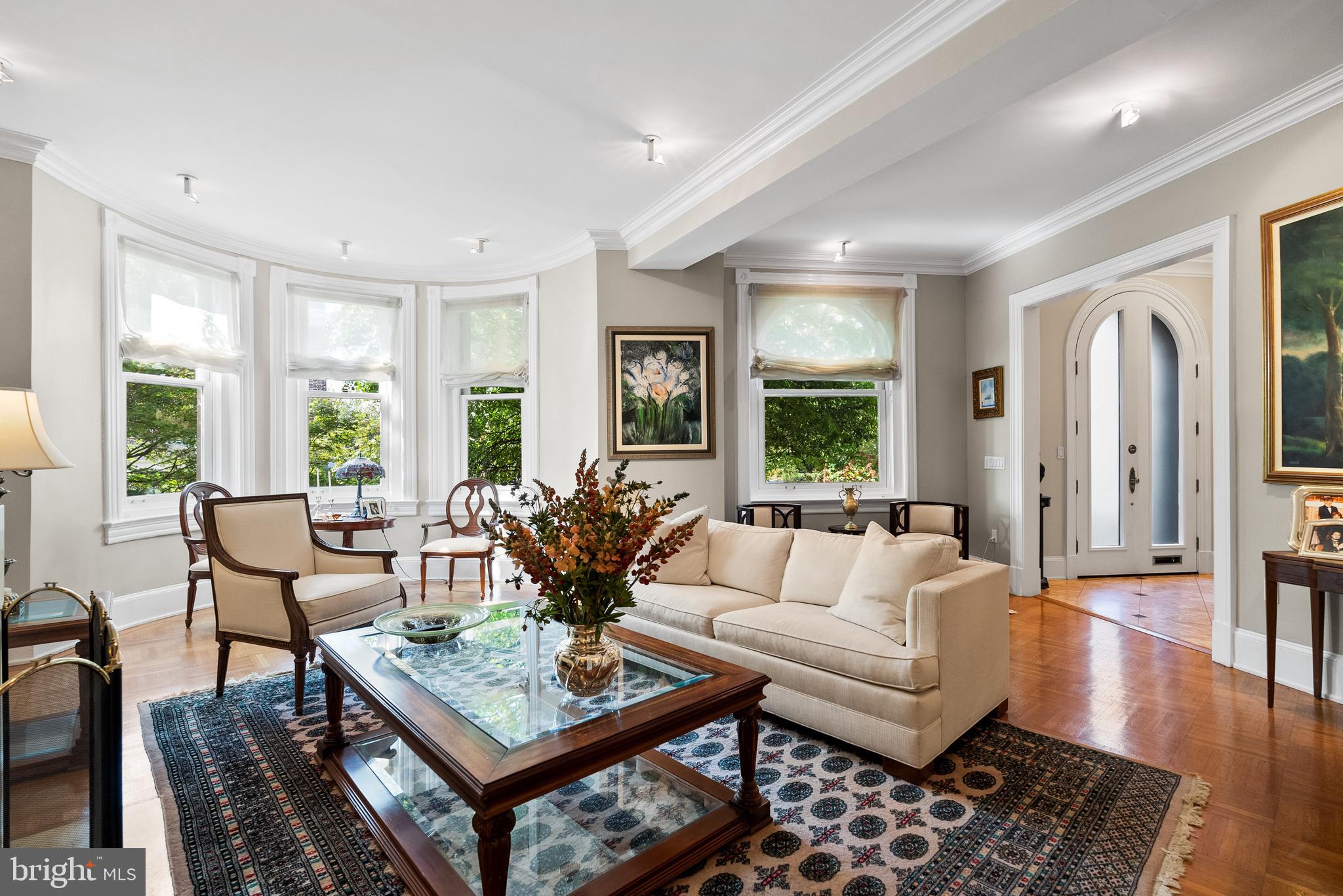 2131 S Street Northwest Washington, DC 20008 - Photo 8 of 29 a living room with furniture and a large window