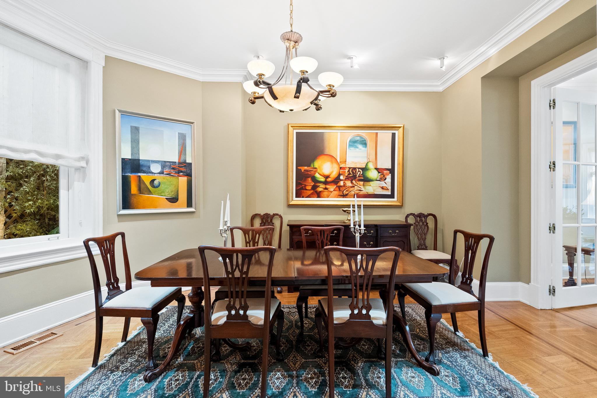 2131 S Street Northwest Washington, DC 20008 - Photo 10 of 29 a view of a dining room with furniture a chandelier and wooden floor