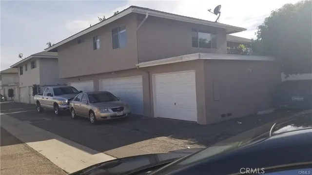 a car parked in front of a house