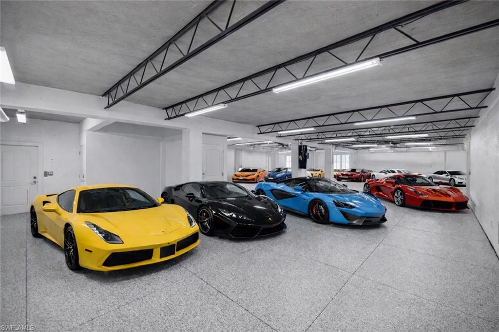 481 21st Avenue South Naples, FL 34102 - Photo 3 of 50 12 Plus Car Garage. Cars Added Digitally In Photograph