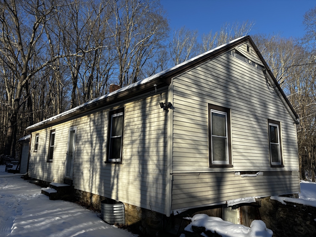 72 Northwest Schoolhouse Road Dudley, MA 01571 - Photo 5 of 5 a view of a house with a house