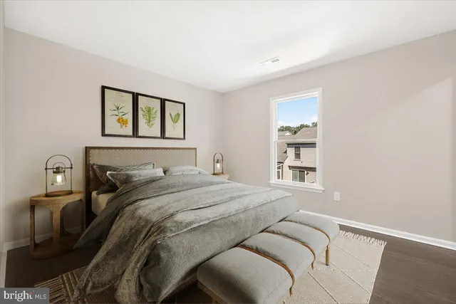 a view of a house with backyard porch and sitting area