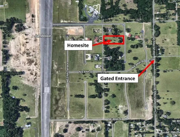 a sign that is sitting on a brick wall