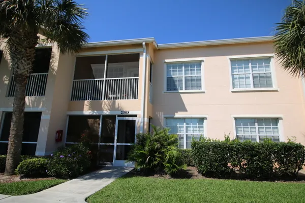 a view front of house with yard and green space