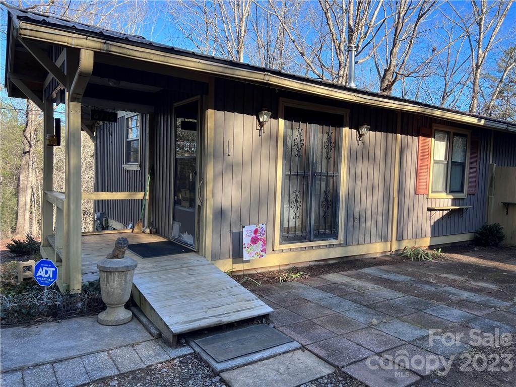 6756 Highway 9 Mill Spring, NC 28756 - Photo 1 of 46 a view of outdoor space and porch