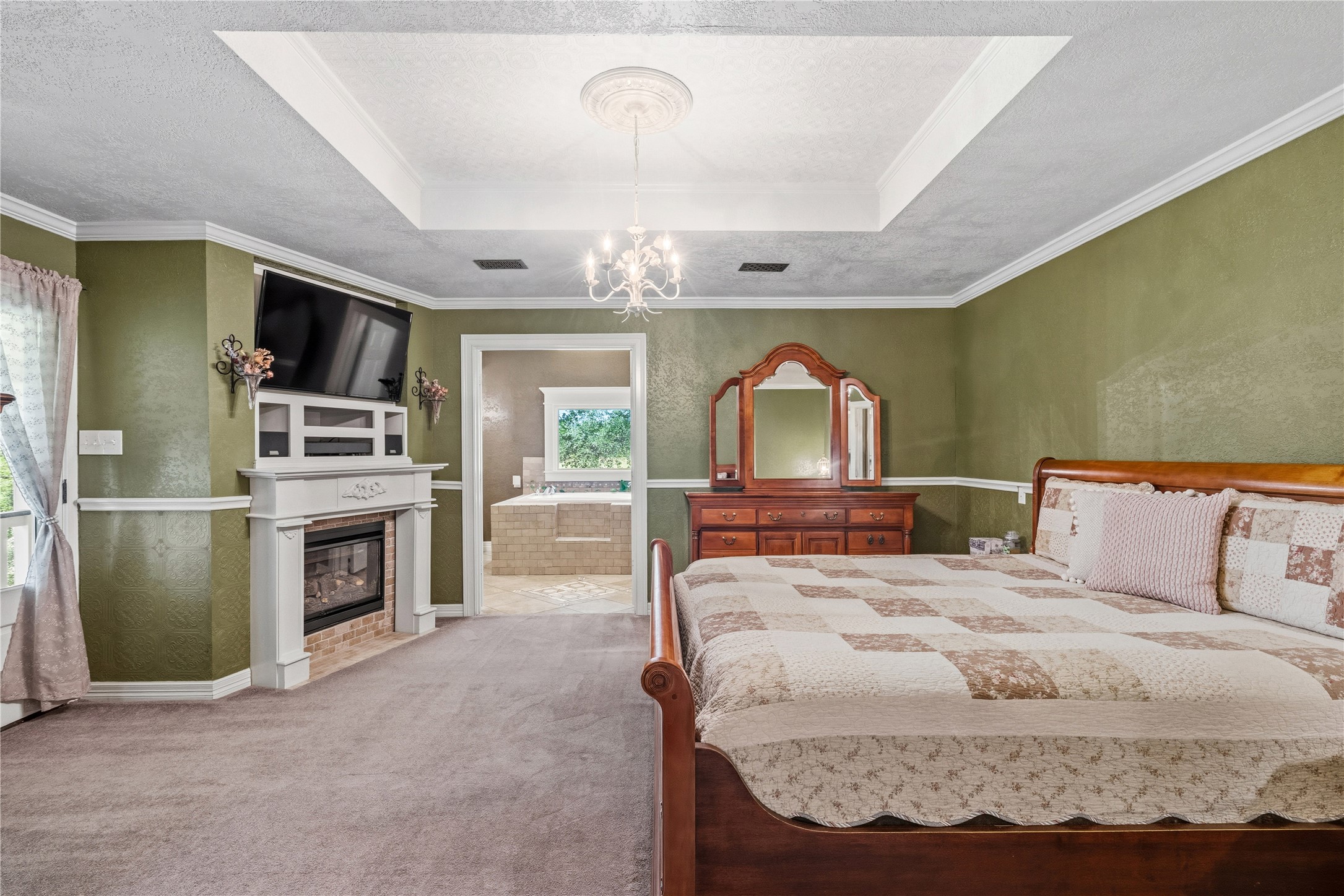 17821 Brown Road Conroe, TX 77306 - Photo 20 of 50 a bedroom with a bed and a television