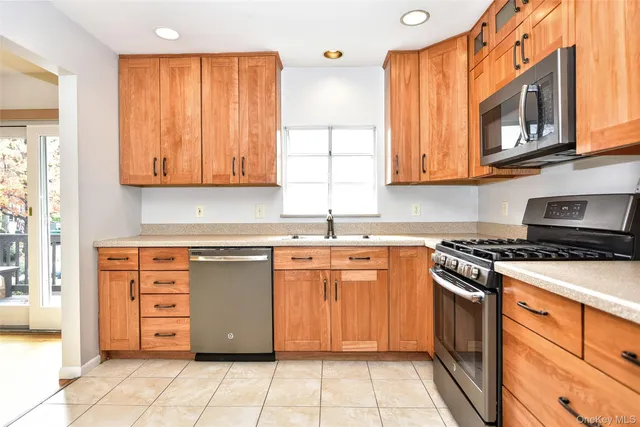 a view of cabinets and window