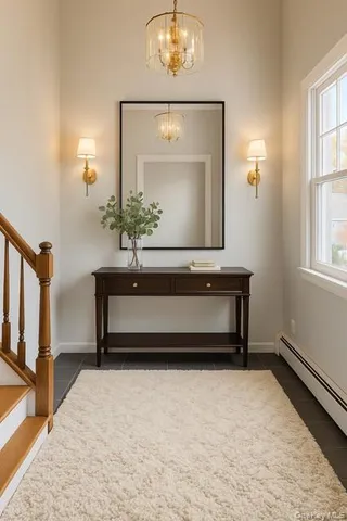 a view of entryway with wooden floor