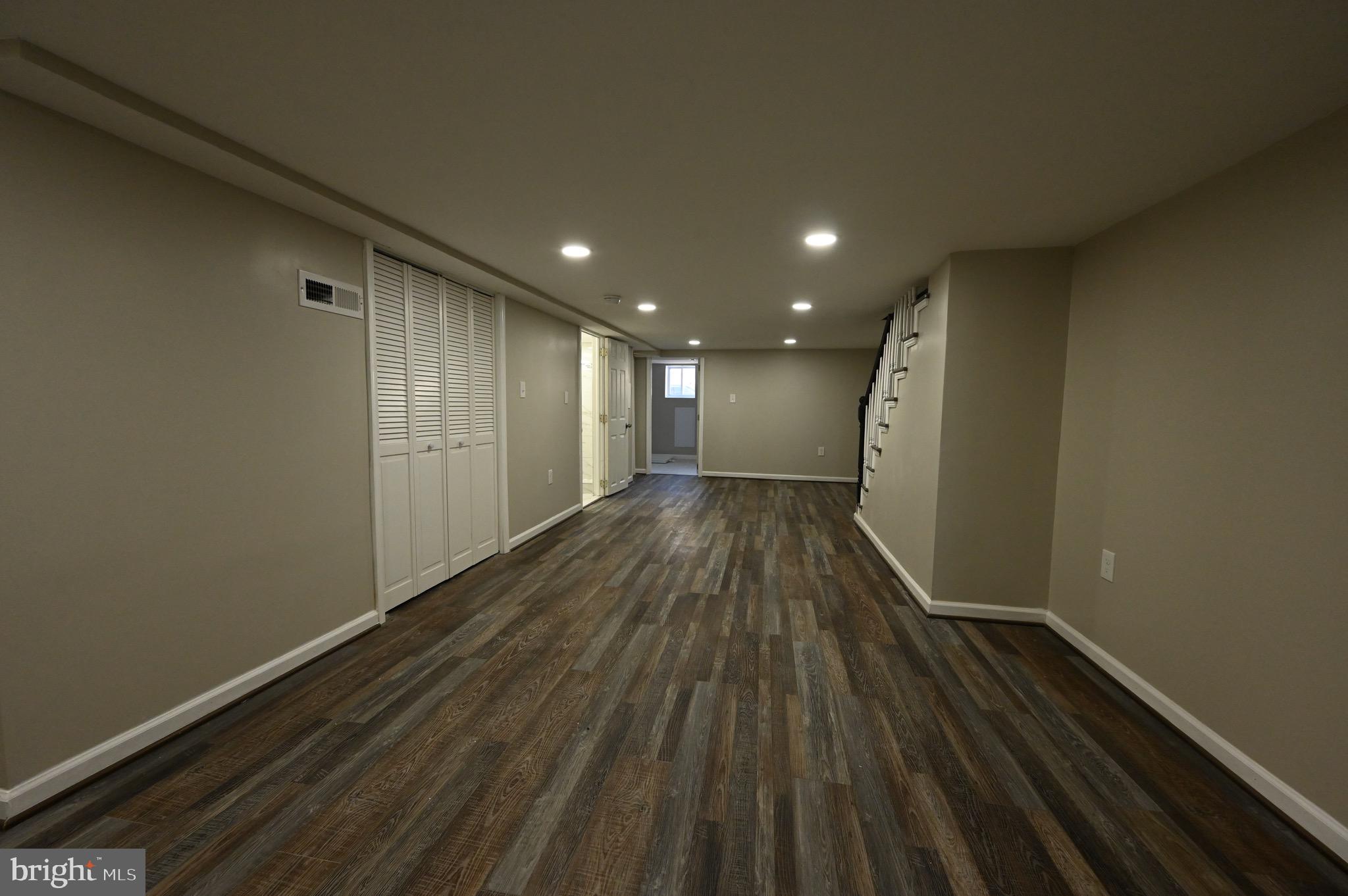 3303 Westerwald Avenue Baltimore, MD 21218 - Photo 27 of 28 a view of hallway with wooden floor