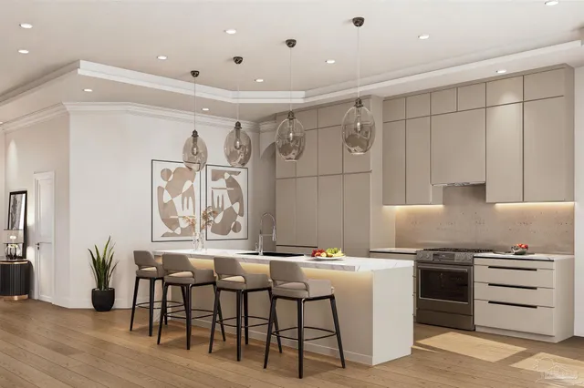 a kitchen with stainless steel appliances kitchen island granite countertop a sink and cabinets