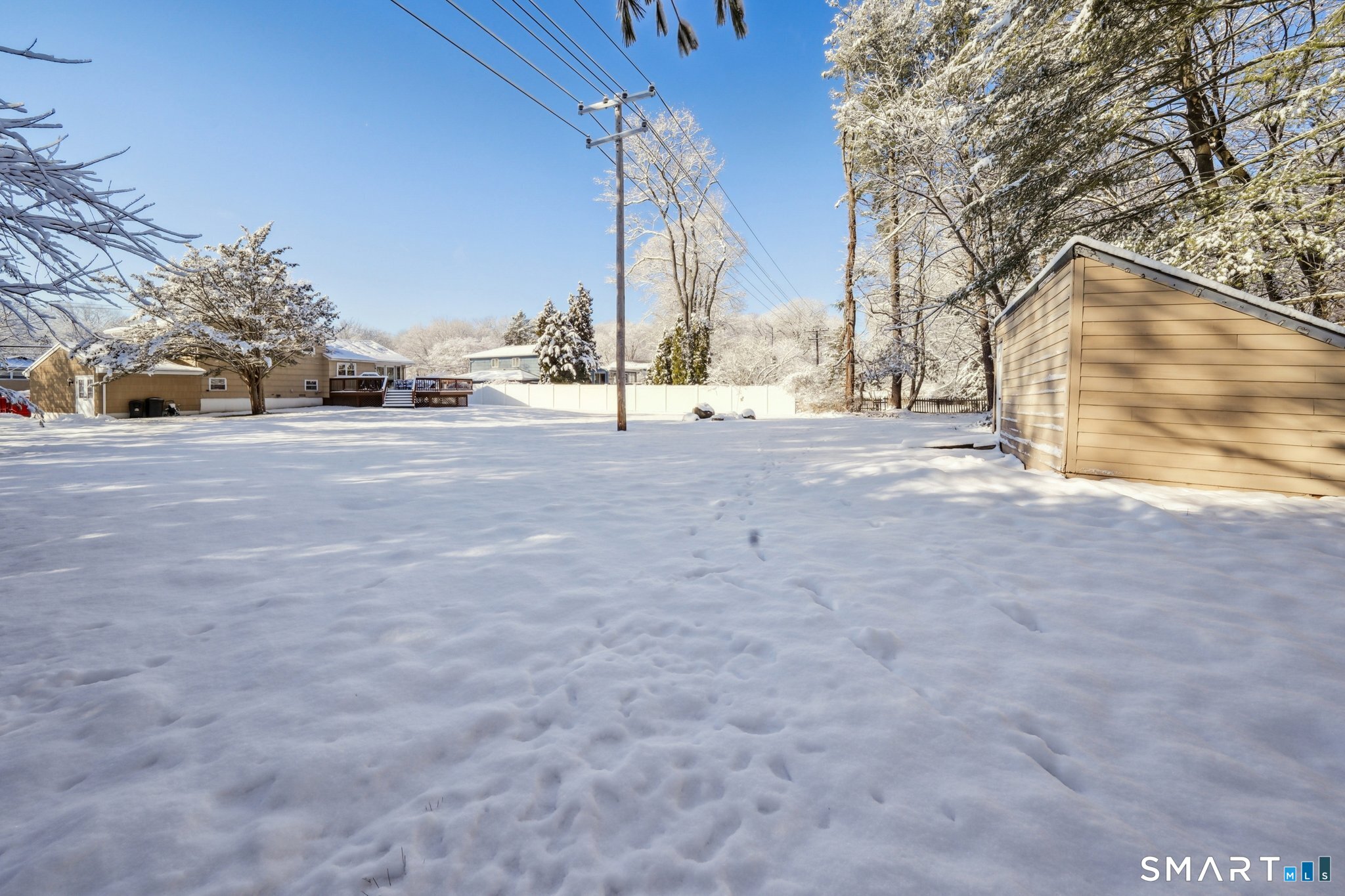 10 Algonquin Road Norwalk, CT 06851 - Photo 18 of 24 The view from the farthest point in the backyard looking at the back of the house!