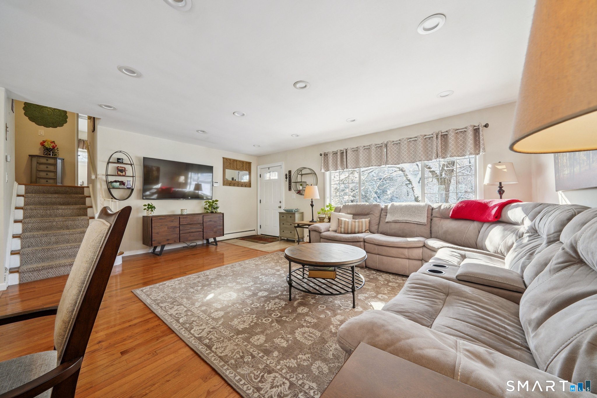 10 Algonquin Road Norwalk, CT 06851 - Photo 24 of 24 Expansive open floor plan and oversized windows allow natural light to pour into this home!