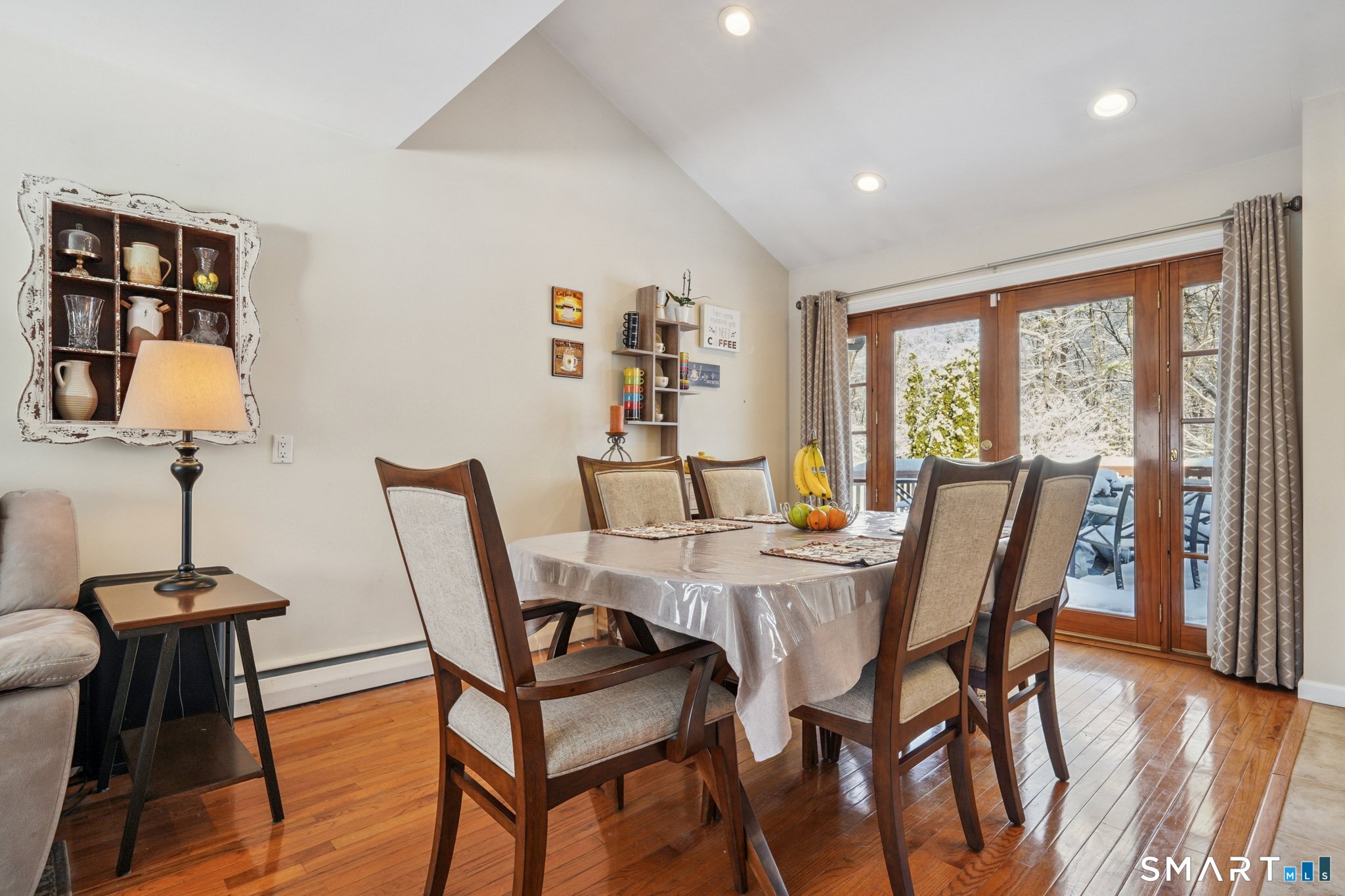 10 Algonquin Road Norwalk, CT 06851 - Photo 4 of 24 Dining area with French doors open to an large, well-maintained deck! Watch the sunsets at the end of the day!